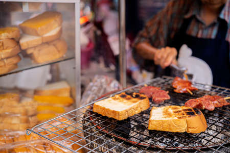 Asian toast. Thai street food vendor in Bangkok, Thailand. Streetfood in south east asiaの写真素材