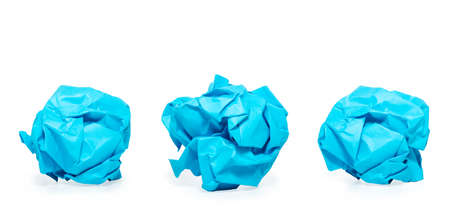 Blue colored paper ball isolated on white background. Picture taken in studio with soft-box.の写真素材
