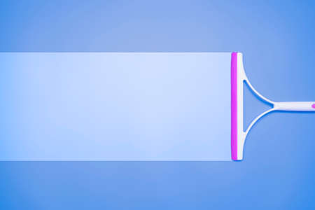 Blue plastic pvd cleaning with squeegee, can put message for communication.の写真素材