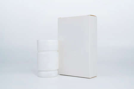 Medicine bottle and package isolated on white backgroundの写真素材