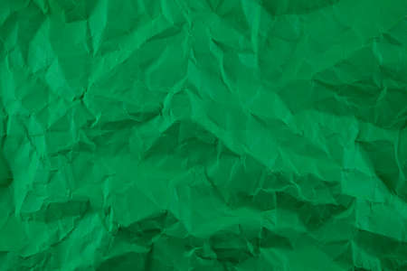 Minimal green crumpled paper texture background for Design. Copy space for text or workの写真素材