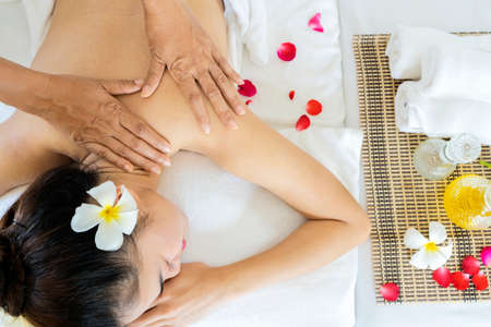 Body care. Spa body massage woman hands treatment. Woman having massage in the spa salonの写真素材
