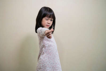 Child girls hands making small heart. Love and happiness concept. Selective focus on hand.