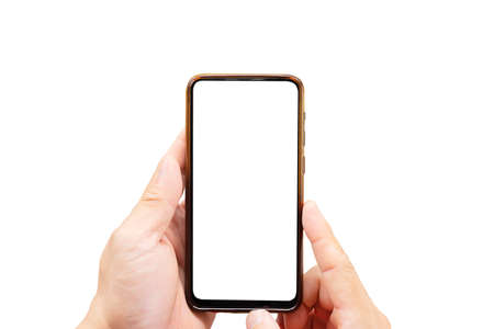 Isolated hands and smartphone on white background. Man hand holding modern black phone in vertical position.の写真素材