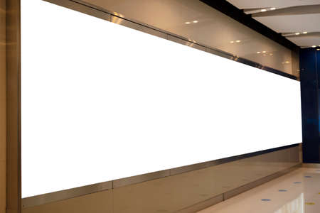 Large blank billboard on a street wall, banners with room to add your own textの写真素材
