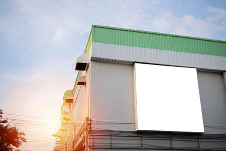 large blank billboard in city view background. Advertisement,Large blank billboard on a street wall, banners with room to add your own textの写真素材