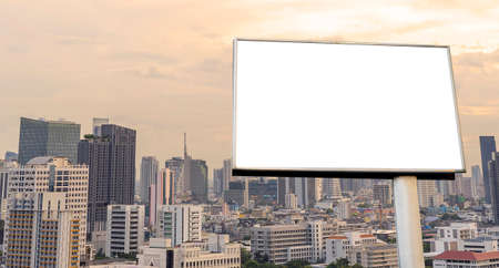 Blank billboard at twilight for advertisement. Street advertising poster, mock up, 3D rendering. Side view. The concept of marketing communication to promote or sell idea.の写真素材