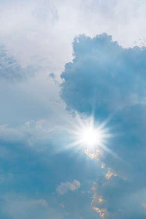 Morning sky with white clouds, Vertical Spring sky scape in blue and yellow colour,Vector background of nature sky in sunny day Summer background, World environment day conceptの写真素材
