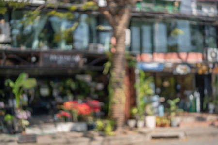 Blurred background of outdoor cafes. Abstract blur coffee shop background - vintage filter effectの写真素材