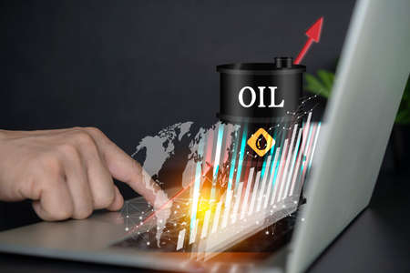 oil barrels with a growth chart in the investment market and trade arrows up and map world representing the global network line wire frame data business 3d illustrationの写真素材