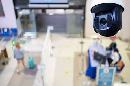 Closed-circuit television,Security CCTV camera or surveillance system in background of Checkpoint - Body and bag Luggage Scan Machine ,Secure Airport Check Inの写真素材