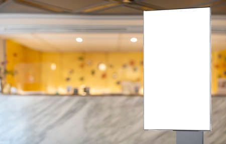 Billboard mock up inside the hotel building near reception area. Template of an interior empty information billboard, Mock-up of a city banner placeholder and poster.の写真素材