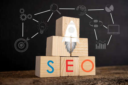 Search engine optimization concept. Wood block cube shape with word SEOの写真素材