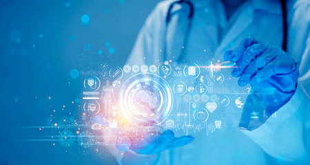 Doctor checking brain testing result with computer interface, innovative technology in science and medicine concept, innovative technology in science and medicine conceptの写真素材