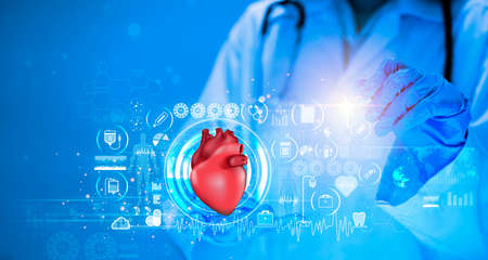 Heart hologram and doctor, heart disease. Health care of the future. Modern Medical Science, Hi Tech Diagnostic Panel. Mixed medium, copy spaceの写真素材