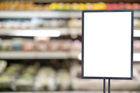 Mockup advertising board in front of supermarket. Mock up billboard for your text messege or mock up content with department store or shopping mall background.の写真素材