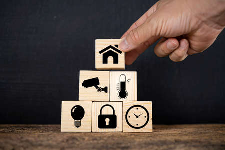 Wooden blocks with icons of various types of insurance, icons healthcare medical symbol on wooden block , Healthcare and medical Insurance concept, inscription word sos on wooden cubesの写真素材