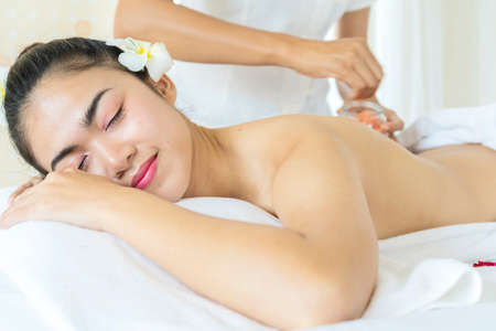 Top View of Asian Woman Having Back Massage in a spaの写真素材