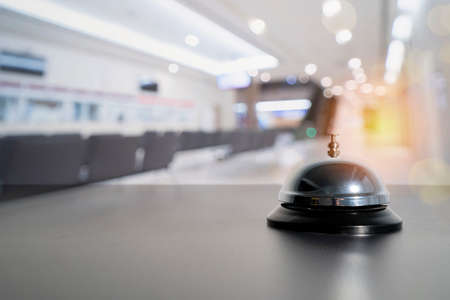Hotel service bell on black table. Concept hotel, travel, room