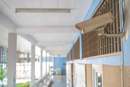 CCTV system inside the building, white walls, corridors on the buildingの写真素材