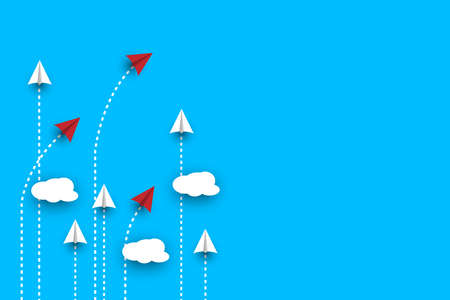 Group of white paper plane in one direction and one red paper plane pointing in different way on blue background. Business for innovative solution concept.の写真素材