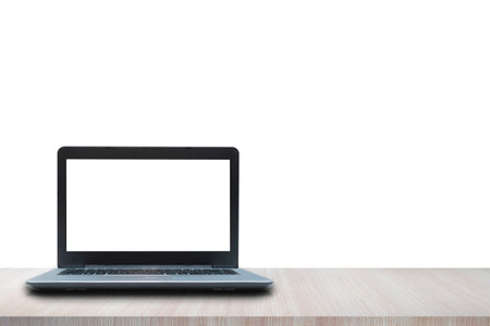 Laptop blank screen on wooden table isolated on white background. Can add background images and text for advertising media.の写真素材
