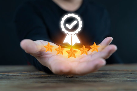 Hand shows the sign of the top service Quality assurance 5 star, Guarantee, Standards, ISO...