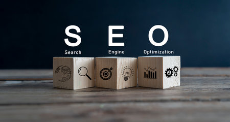 SEO (Search Engine Optimization) text wooden cube blocks on table background. Idea, Vision, Strategy, Analysis, Keyword and Content conceptの写真素材