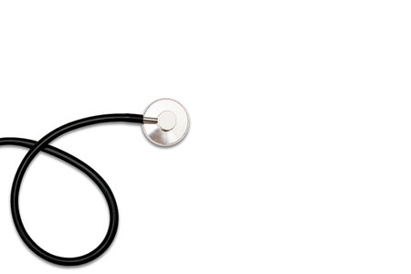 Headphones on a white background are reflected into shadows. Medical stethoscope. health care service concept background. Empty spaces can include text, images for advertising purposes.の写真素材