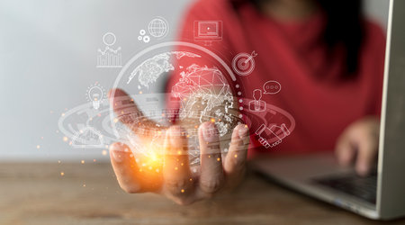 woman Hand holding virtual Global Internet connection metaverse. Business global internet connection application technology and digital marketing, Financial and banking, Digital link tech, big data.の写真素材