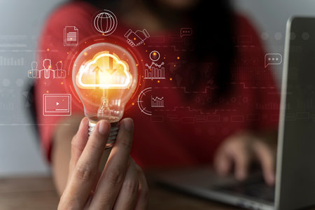 woman Hand holding Light bulb Global Internet connection. Business global internet connection application technology and digital marketing, Financial and banking, Digital link tech, big data.の写真素材