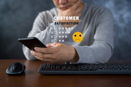 Customer Experience dissatisfied Concept, Unhappy Businessman Client with Sadness Emotion Face on smartphone screen, Bad review, bad service dislike bad quality, low rating, social media not good.の写真素材