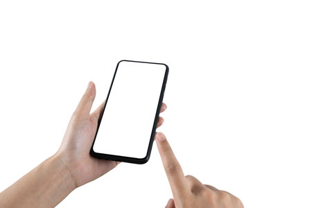 Close up of woman hand using smartphone isolated. Female hands showing empty white screen of modern smart phone isolated white background.の写真素材