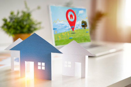 Land or landscape of green fields on laptop icon of residence, home or house building. Real estate or property for dream concept to build, construction, sale and buy.の写真素材