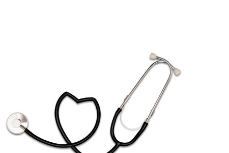 Stethoscope on white isolated background, heart shaped stethoscope. health care service concept backgroundの写真素材