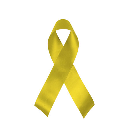 Yellow ribbon isolated on white background. Troop support, suicide prevention, bone cancer, adoptive parents symbol.の写真素材