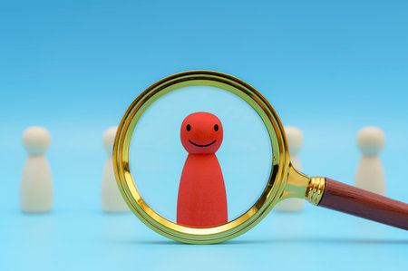 Human resources management and recruitment concept. Magnifying glass is searching for the human icon. Magnifying glass. management. Candidate selectionの写真素材