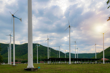 Wind farm in Thailand, isolated wind turbine in courtyard with large solar panel on beautiful sunny day. Large wind turbineの写真素材