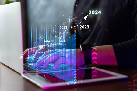 Businessman draws increase arrow graph corporate future growth year 2023 to 2024. New Goals, Plans and Visions for Next Year 2024.Planning,opportunity, challenge and business strategy.の写真素材