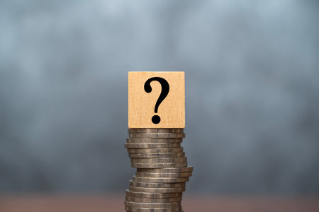 Question mark with coins stack on the gray background. Money offer concept. Mock up for different business ideas. Empty place for a text. Question mark with stack of money coin, Problem Conceptの写真素材