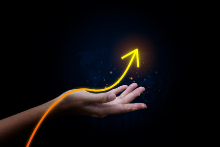 Hand pointing growth arrow success business target background of up icon direction development graph or investment finance profit stock market chart symbol and goal achievement on economy marketing.の写真素材