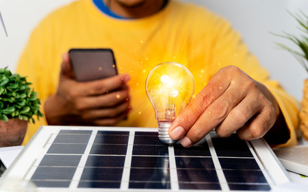 Energy engineers people holding light bulbs while thinking. Innovative concept, thinking of natural...
