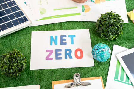 Goal of achieving net zero emissions, represent the progress that has been made towards this goal. It could also be used to raise awareness about the importance of reducing greenhouse gas emissions.の写真素材