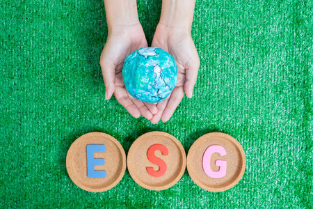 ESG concept of environmental, social and governance.words ESG on a woodblock It is an idea for sustainable organizational development. âaccount the environment, society and corporate governanceの写真素材