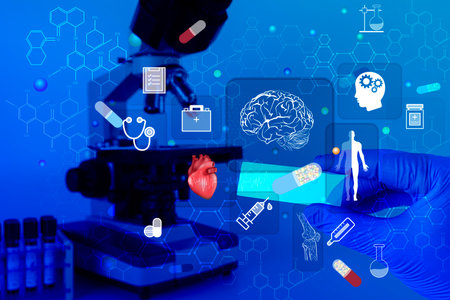 Closeup of hand glove of scientist glass on the inverted microscope for bioassay in the laboratory. Research for pharmaceutical and biotechnology development. Science concept, chemistry, biology.の写真素材