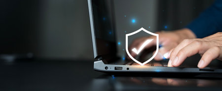 Safety quality management concept. Certified guarantee approval or Secure access system. identity proofing for security protection system. Cropped shot of businessman hand typing on laptop compute.の写真素材