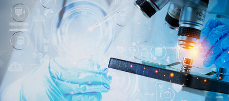 Research and developement concept background of scientist or reseacher using microscope in biotechnology laboratory  overlay with DNA strand and molecules symbol, concept of DNA engineeringの写真素材