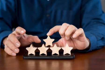 Service Provider Satisfaction Ratings and Evaluations. Customer service and Satisfaction concept ,Business people are touching the virtual screen on five star to give. rating very impressedの写真素材
