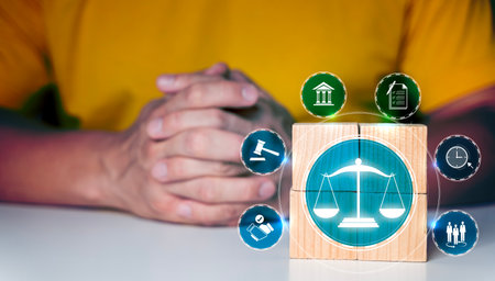 Wooden blocks laying on the table,law legal services advice and inspection,legal and justice concepts,document approval,legal Document Icon,labor law,law and defense.の写真素材