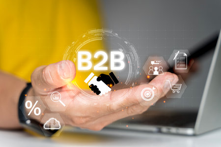 B2B marketing concept, business to business, e-commerce, businessman use laptop with B2B icons for professional business and commerce collaboration. business action plan strategy.の写真素材